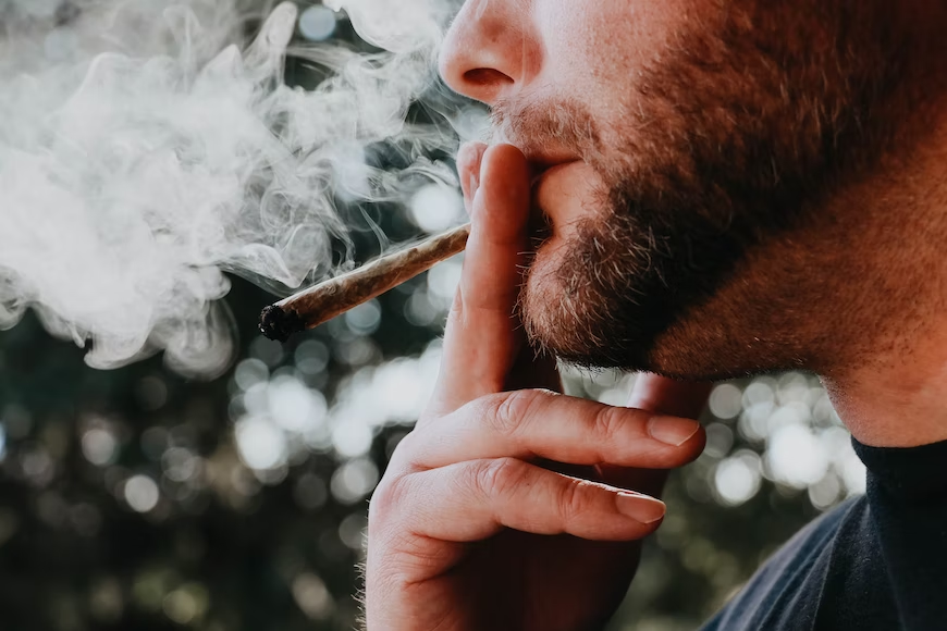 A man smoking weed